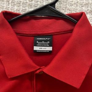Nike golf shirt , dri fit, red in color, lightly used, XL